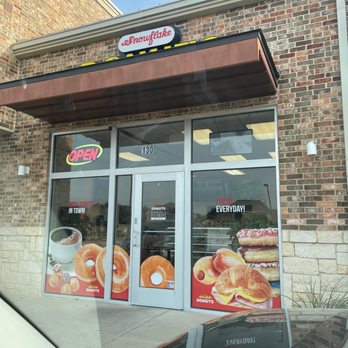 Snowflake Donuts - the front of a donut shop - Donuts Near Me - Mansfield, Texas