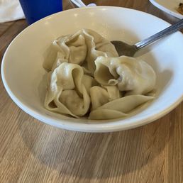 Chicken Wontons with Spicy Sauce on the side Chicken Wontons with Spicy Sauce on the side