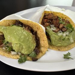 Carne asada and al pastor tacos