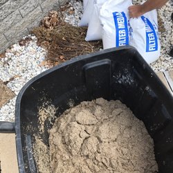 Sunset Aquatech Pools - Here is the shitty sand that I had to replace my self with the time I don't have. Notice proper sand in the background.
