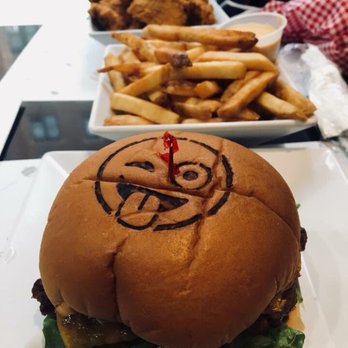 Emoji Burger - DaWink Burger: Bacon Cheeseburger and a side of fries with cheese - Burgers Near Me - Jackson Heights, New York