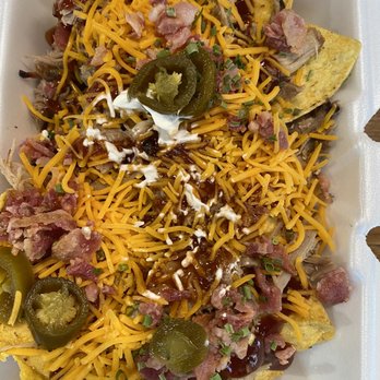 Poppy's Smokehouse - nachos in a styrofoam container - Barbeque Near Me - Addison, Alabama