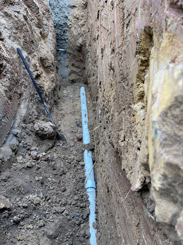 Slide of Clogrooter Services