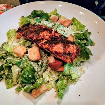 Rainforest Cafe - Big Islander Caesar Salad with blackened salmon - American Near Me - Ontario, California Rainforest Cafe - Big Islander Caesar Salad with blackened salmon - American Near Me - Ontario, California
