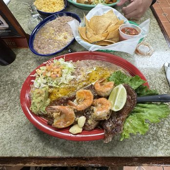 Acapulco - Steak and shrimp side order beans and rice. Flauta plate. - Mexican Near Me - Waipahu, Hawaii Acapulco - Steak and shrimp side order beans and rice. Flauta plate. - Mexican Near Me - Waipahu, Hawaii