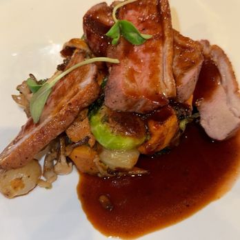 90 Restaurant - Pan Roasted Duck Breast Two ways Duck Breast. Sweet Potato Hash, Brussels Sprouts, Onions, Wild Mushrooms, Topped with Quince Red Wine Sauce - New American Near Me - Winthrop, Massachusetts