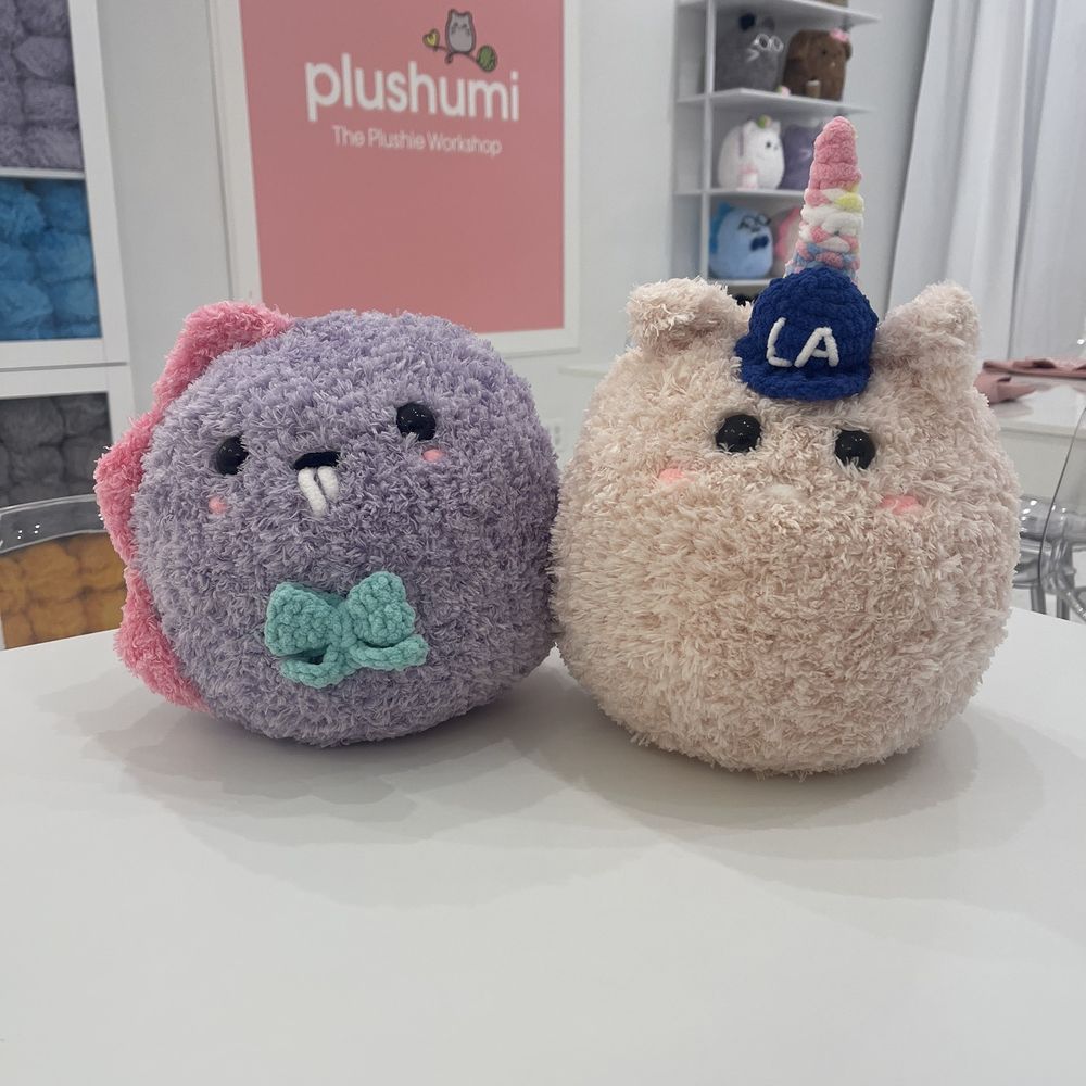 The Plushie Workshop - Purple dino with turquoise bow tie and light pink unicorn (looks like cat lol) with Dodgers hat! - Kids Activities Near Me - Pasadena, California The Plushie Workshop - Purple dino with turquoise bow tie and light pink unicorn (looks like cat lol) with Dodgers hat! - Kids Activities Near Me - Pasadena, California
