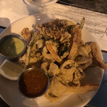 Perla's - Salt and Jalapeno Pepper Fried Calamari - Seafood Near Me - Austin, Texas Perla's - Salt and Jalapeno Pepper Fried Calamari - Seafood Near Me - Austin, Texas