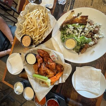 Craggy Range Bar & Grill - Chicken wings, steak bites and blue cheese salad, fries - American Near Me - Whitefish, Montana