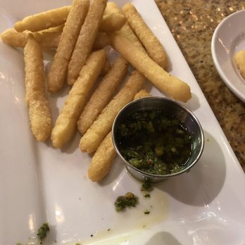 Flair Restaurant & Bar - Yucca fries (obviously I couldn't wait to try the chimichurri before the picture) - New American Near Me - Southington, Connecticut Flair Restaurant & Bar - Yucca fries (obviously I couldn't wait to try the chimichurri before the picture) - New American Near Me - Southington, Connecticut