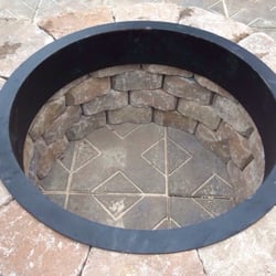 Lowe's Home Improvement - Fire pit ring with three stacks of 12 stones each - we added 2 extra stacks to total 5 stacks; 24 additional stones