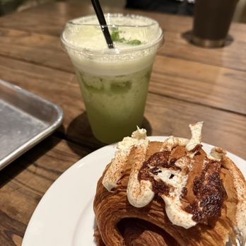 Leona Botanical Cafe & Bar - Croissant and drink - Cocktail Bars Near Me - Sunset Valley, Texas Leona Botanical Cafe & Bar - Croissant and drink - Cocktail Bars Near Me - Sunset Valley, Texas
