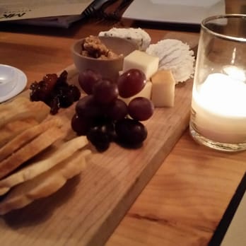 MK Kitchen - Cheese board and candles. - New American Near Me - Gorham, Maine