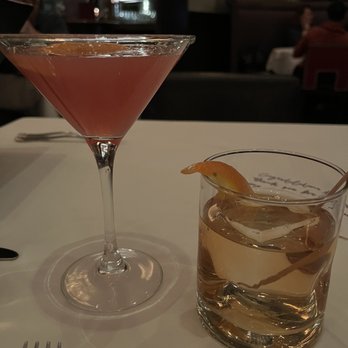 Tellers An American Chophouse - Teller's twist on the Old Fashioned, an Oaxaca Smoked Old Fashioned; and a specialty martini - Steakhouses Near Me - Islip, New York Tellers An American Chophouse - Teller's twist on the Old Fashioned, an Oaxaca Smoked Old Fashioned; and a specialty martini - Steakhouses Near Me - Islip, New York