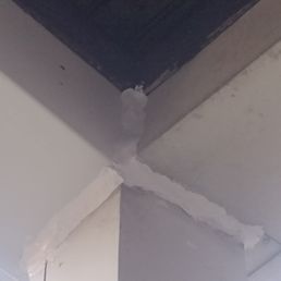 Sloppy caulking, this was suppose to be better then the clear half caulking that they did at first.