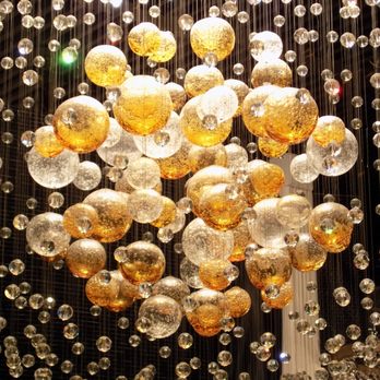 Allied Lighting - A levitating sphere of crystal and glass!This fixture produces a subtle sparkle of light from downlights. - Lighting Fixtures & Equipment Near Me - Tustin, California
