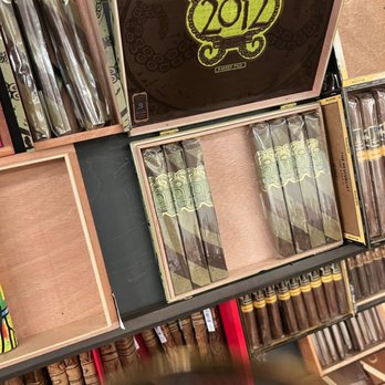 Churchill's Fine Cigars - cigars on shelves - Cigar Bars Near Me - Scottsdale, Arizona Churchill's Fine Cigars - cigars on shelves - Cigar Bars Near Me - Scottsdale, Arizona