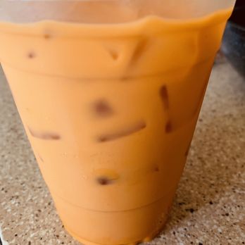 Thai Street Bistro - Thai tea have a strong delicious flavor but the cream added to it is a little rich but overall it's pretty good when you add a little water - Thai Near Me - Sacramento, California Thai Street Bistro - Thai tea have a strong delicious flavor but the cream added to it is a little rich but overall it's pretty good when you add a little water - Thai Near Me - Sacramento, California