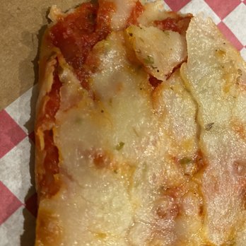 Pizza Time - Close up of cheese slice cold - Italian Near Me - Boca Raton, Florida Pizza Time - Close up of cheese slice cold - Italian Near Me - Boca Raton, Florida