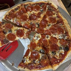 Pepperoni, hamburger, and black olive medium pizza
