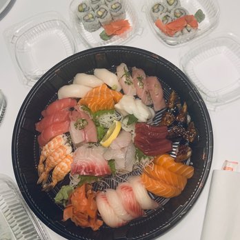Yirasai Sushi & Cafe - Sushi (nigiri) and sashimi platter w/Cali roll in the background - Sushi Bars Near Me - Potomac, Maryland Yirasai Sushi & Cafe - Sushi (nigiri) and sashimi platter w/Cali roll in the background - Sushi Bars Near Me - Potomac, Maryland