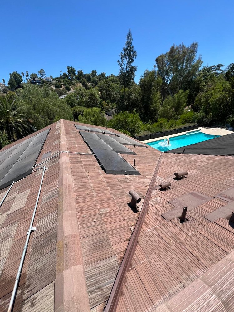 Slide of R Squared Roofing Services