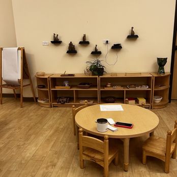 Cosmic Montessori Community - 2 year old classroom - dark because I took this pic during parent open house at night - Montessori Schools Near Me - Aurora, Illinois Cosmic Montessori Community - 2 year old classroom - dark because I took this pic during parent open house at night - Montessori Schools Near Me - Aurora, Illinois