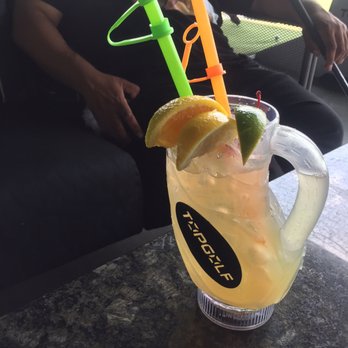 Topgolf - $16.00 Pineapple punch. You get to keep the light up cup and plastic golf straws - New American Near Me - Edison, New Jersey Topgolf - $16.00 Pineapple punch. You get to keep the light up cup and plastic golf straws - New American Near Me - Edison, New Jersey