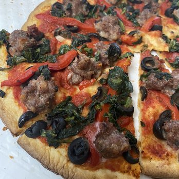 Town Hall Pizza - Burnt cauliflower pizza. - Pizza Near Me - Berrien Springs, Michigan Town Hall Pizza - Burnt cauliflower pizza. - Pizza Near Me - Berrien Springs, Michigan