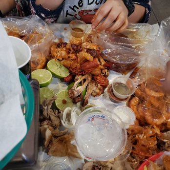 The Boiling Crab - Making the best of the table paper cover. Yum. - Seafood Near Me - Alhambra, California The Boiling Crab - Making the best of the table paper cover. Yum. - Seafood Near Me - Alhambra, California