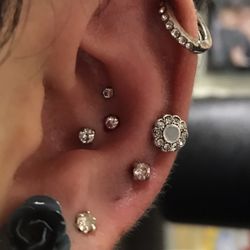 Karma - Triple conch piercings