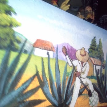 Mi Ranchito - The artwork next to the booths in the bar. - Mexican Near Me - Cotati, California