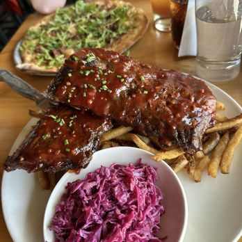 The Bench - ribs (with the vermonter pizza in the back) - Pizza Near Me - Stowe, Vermont The Bench - ribs (with the vermonter pizza in the back) - Pizza Near Me - Stowe, Vermont