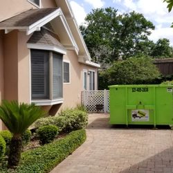 Bin There Dump That - We always use protection, driveway protection!