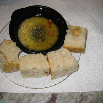 Not Your Average Joe's - Reston - complimentary focaccia and dipping sauce - New American Near Me - Reston, Virginia Not Your Average Joe's - Reston - complimentary focaccia and dipping sauce - New American Near Me - Reston, Virginia