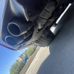 Yellow tape on back left exhausts Yellow tape on back left exhausts