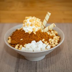 Snow Island - Mac Nut Biscoff Bingsu - House candied mac nuts, house whipped cream, mochi and wafer sticks on original snow.