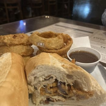 Copper Penny - Hot Roast Pork Sandwich; brings backs memories of our family deli!! Ohhhh so good!! Onion rings!! - American Near Me - Wilmington, North Carolina