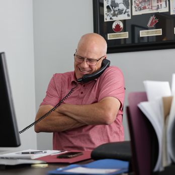 Canadian Mortgage Professionals - Broker Bob Reader on the phone with our mortgage clients - Mortgage Brokers Near Me - Calgary, Alberta Canadian Mortgage Professionals - Broker Bob Reader on the phone with our mortgage clients - Mortgage Brokers Near Me - Calgary, Alberta