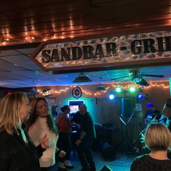 Sandbar Grill - a group of people at a party - Bars Near Me - Bernhards Bay, New York