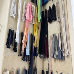 Mendez Cleaners - Hundreds of zippers and thousands of buttons on hand to repair your garments.