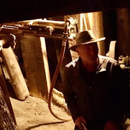 Bill in tunnel explaining the drilling system Bill in tunnel explaining the drilling system