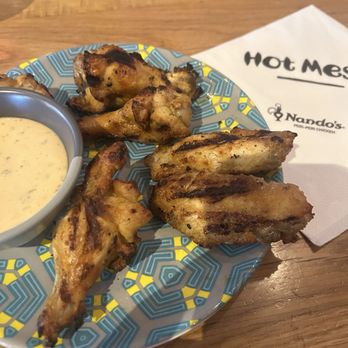 Nando's Peri-Peri - Chicken wings with dipping sauce - Portuguese Near Me - North Bethesda, Maryland Nando's Peri-Peri - Chicken wings with dipping sauce - Portuguese Near Me - North Bethesda, Maryland