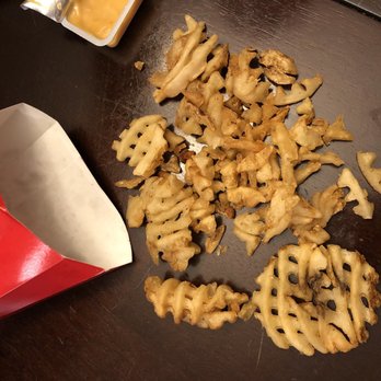 Chick-fil-A - ows a pile of french fries next to a bag of cheese fries - Fast Food Near Me - Cedar Rapids, Iowa Chick-fil-A - ows a pile of french fries next to a bag of cheese fries - Fast Food Near Me - Cedar Rapids, Iowa