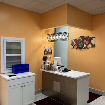 Yummy Bowl - a kitchen with orange walls and white cabinets - Asian Fusion Near Me - Erie, Pennsylvania Yummy Bowl - a kitchen with orange walls and white cabinets - Asian Fusion Near Me - Erie, Pennsylvania