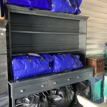 Powerhouse Movers - A kitchen display cabinet completely not wrapped yet used for storage gonna be scraped to hell - Movers Near Me