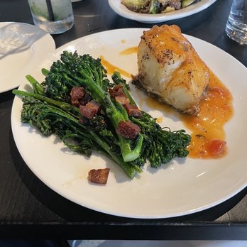 Ampersea - Sea Bass with Broccolini cooked with Bacon - New American Near Me - Baltimore, Maryland