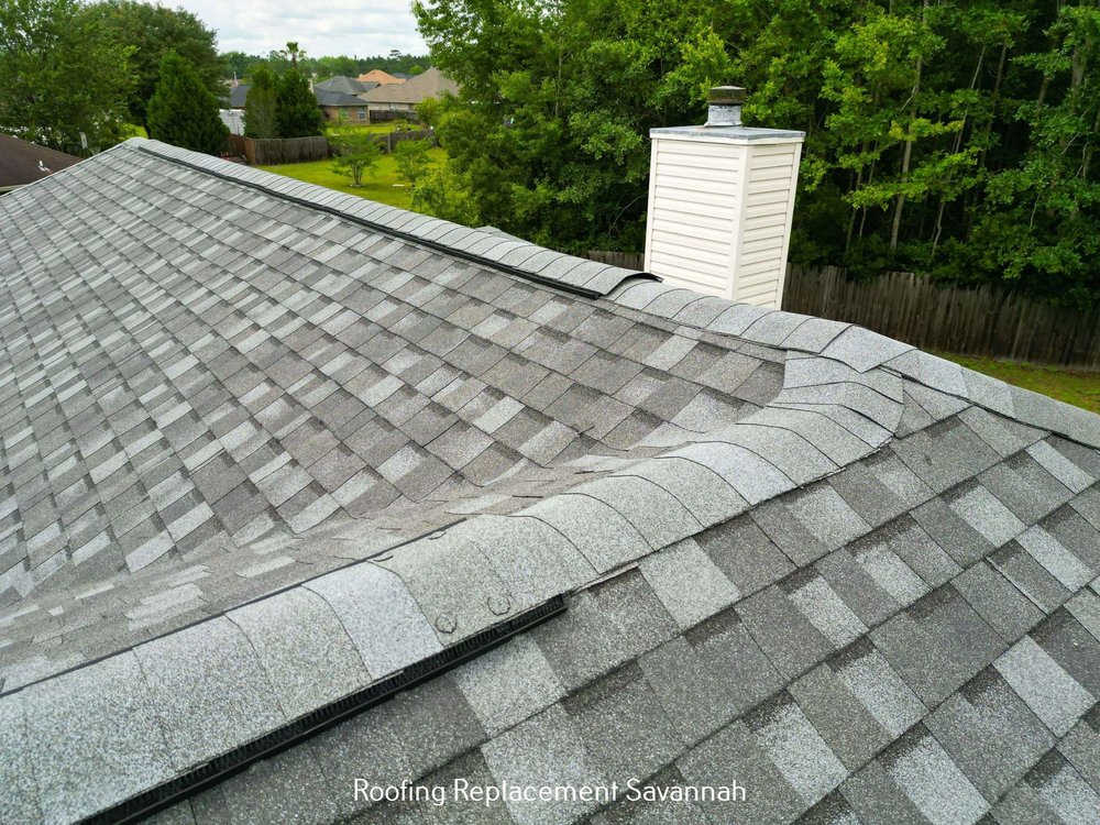 Slide of Talya Roofing