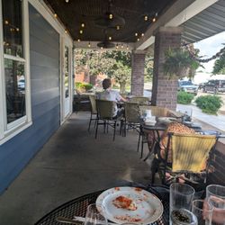 DeLullo's Trattoria - Front porch on a summer eve
