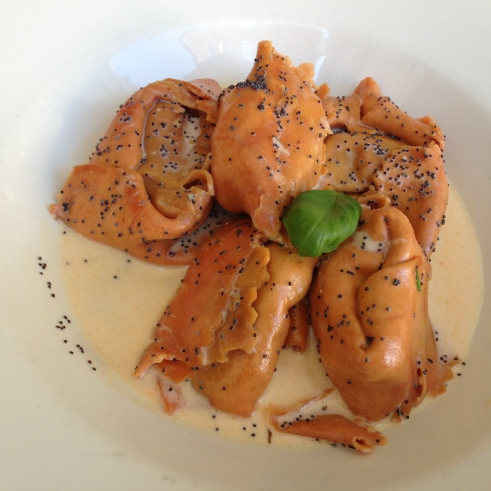 Marietta Cucina - Tortelloni with a radicchio filling, in a mascarpone-poppy seeds sauce. - Caterers Near Me - Munich, BY Marietta Cucina - Tortelloni with a radicchio filling, in a mascarpone-poppy seeds sauce. - Caterers Near Me - Munich, BY